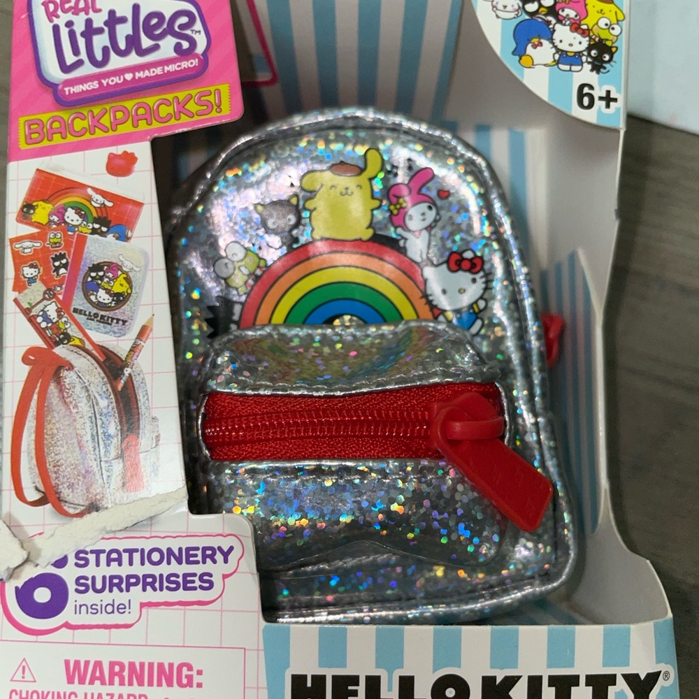 Hello Kitty Silver Backpack with Rainbow and Red Accents